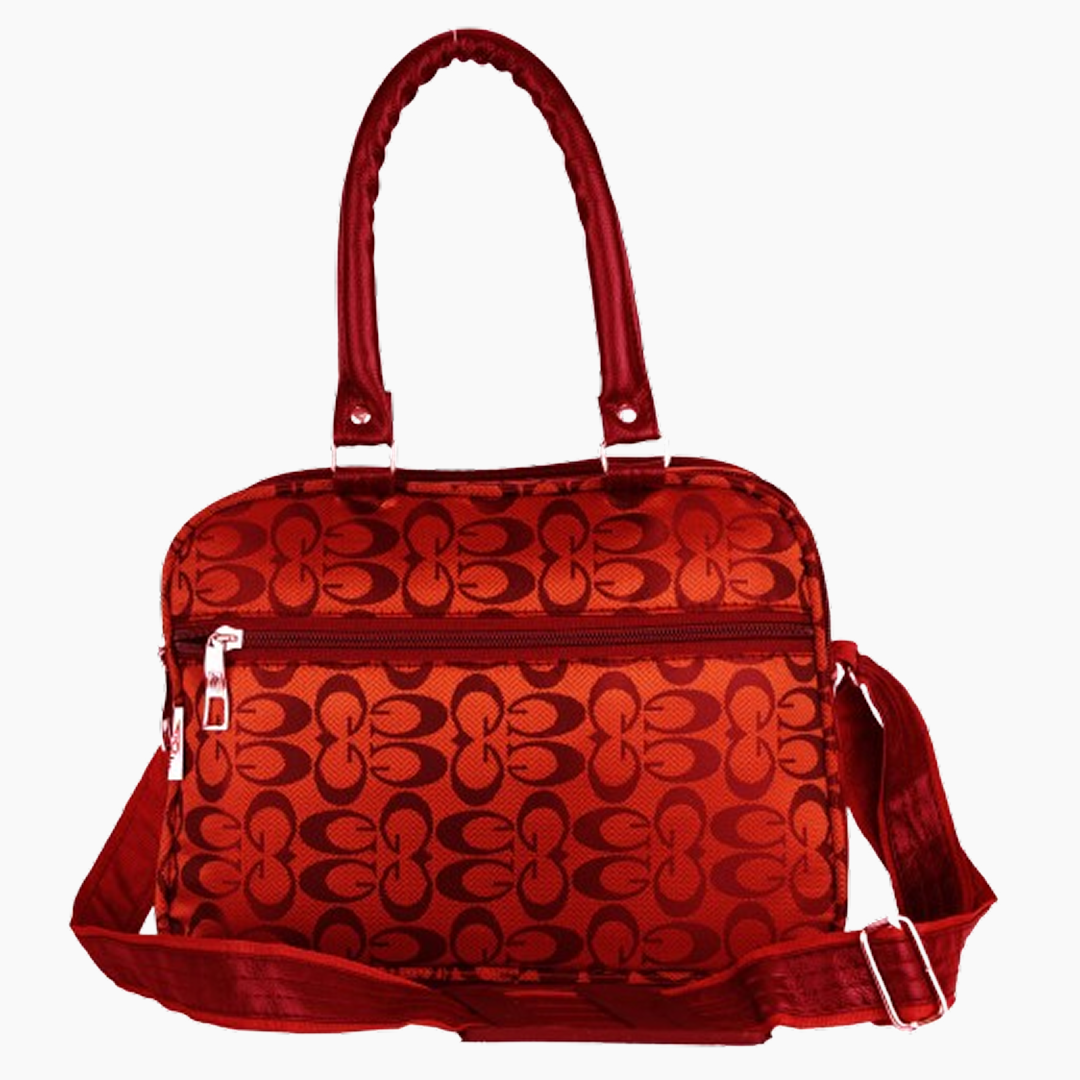 Red handbag with a pattern on a white background -Red